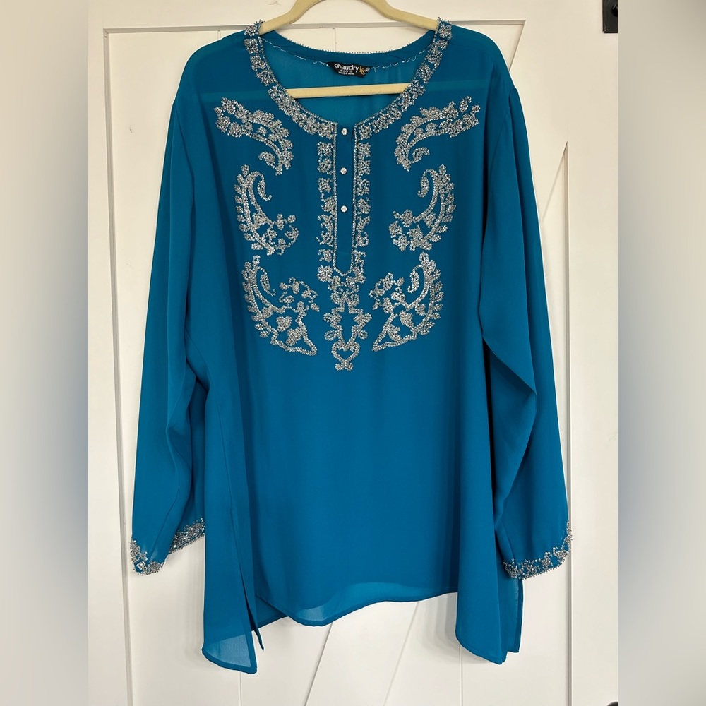 Beautiful sparkly teal blue sheer blouse